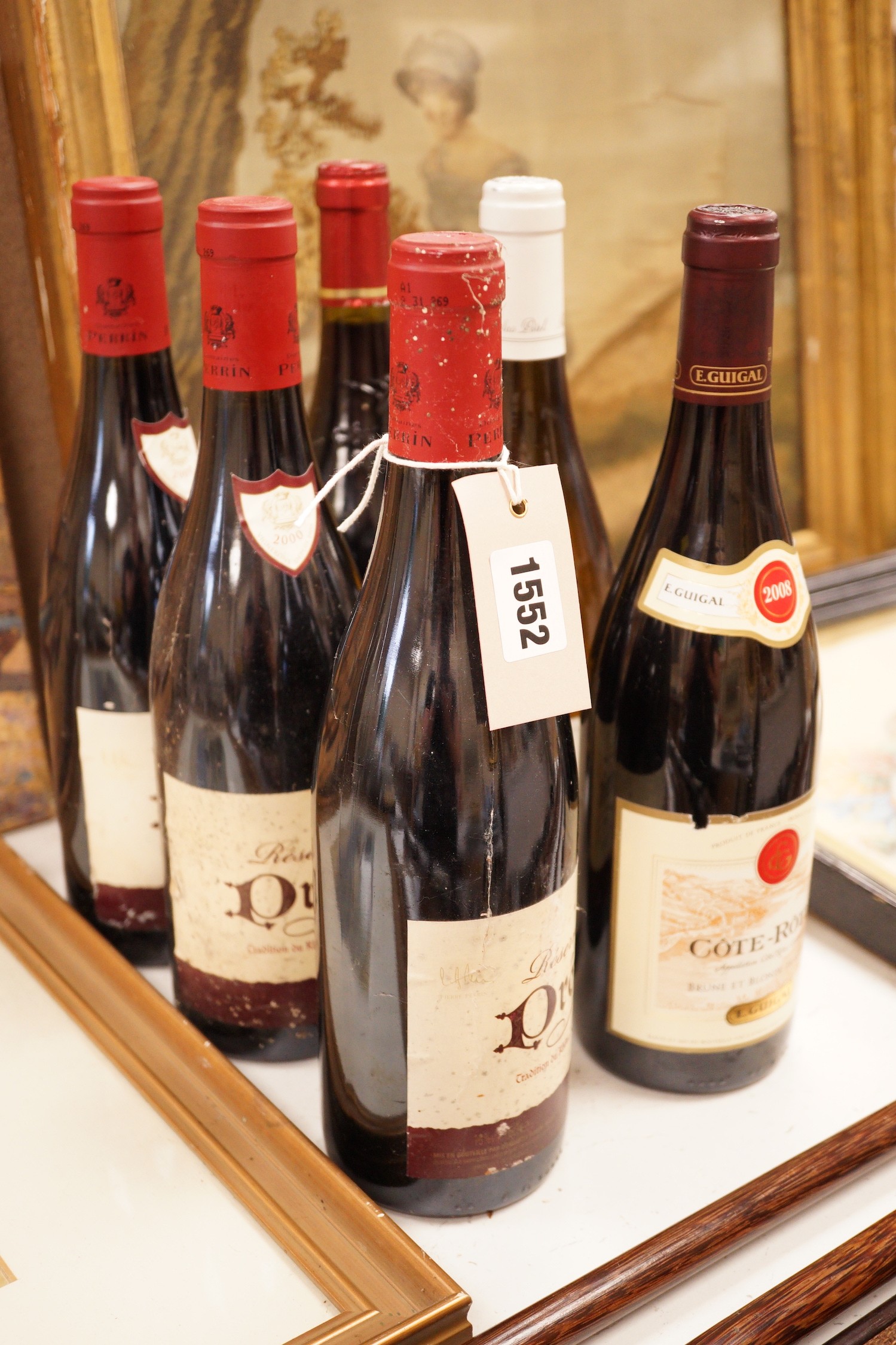 A group of 6 various bottles of wine